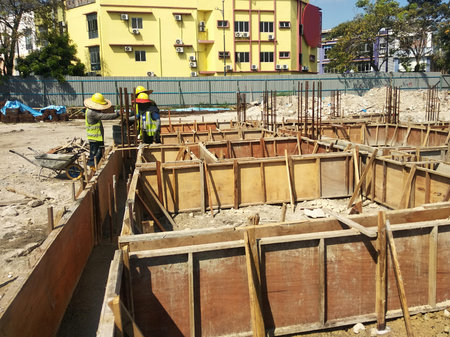 PENANG, MALAYSIA -MARCH 7, 2021: Building ground beam under construction at the site using timber...