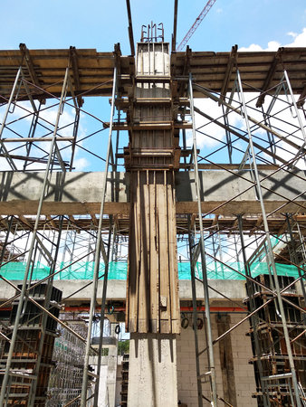 KUALA LUMPUR, MALAYSIA -SEPTEMBER 19, 2020: Column timber formwork and reinforcement bar at the...