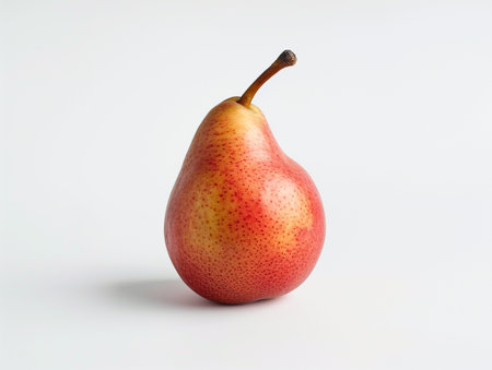 Ripe red pear on a white background. Ripe fruit.の素材