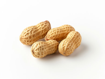 Peanuts isolated on white background. Close-up image of peanuts.の素材
