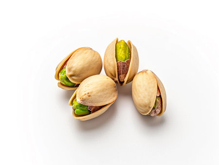 Pistachio nuts isolated on white background. Healthy food.の素材