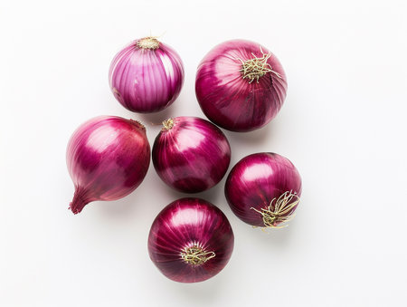 Red onion isolated on white background. Flat lay, top view.の素材