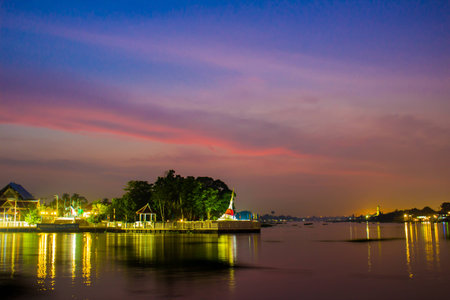 In the evening sunset and the slant pagoda is one landmark of Thailand.の写真素材