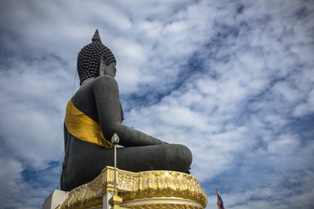 Black idol worship in Thai temple be respectful of many people.の写真素材
