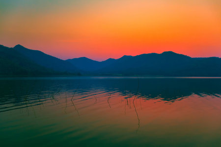 Sunrise sky over the lake in the morning. Thailand.の写真素材
