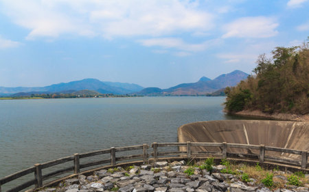 spillway and the reservoir with forest and water conservation in Thailand.の写真素材