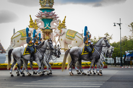 Soldiers march across the Grand Palace in Bangkok, Thailand to celebate the King rama9 birth...