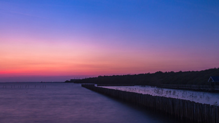 Longexposure romantic landscape sunset over the sea. Bangpoo Samutprakran Thailand. Longexposure shoot.の写真素材