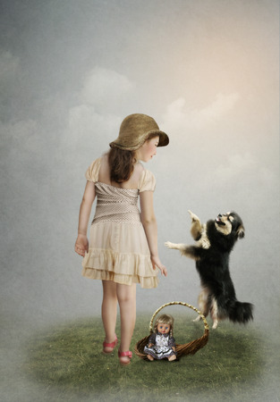 Little girl and dogの写真素材