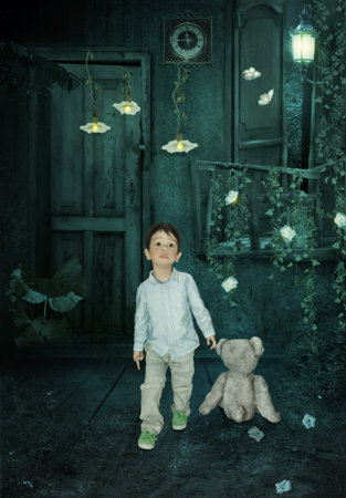 Baby with a surprised look in the mysterious roomの写真素材