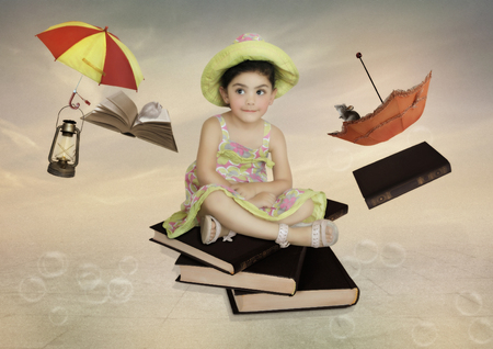 The little girl with sly lookの写真素材