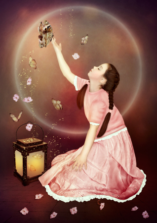 Little girl and butterflies in the light of lanternの写真素材