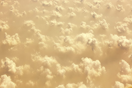 Aerial cloudscape showing interesting clouds in golden light.