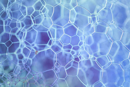 Abstract patterns of soap bubbles in purple color.の写真素材