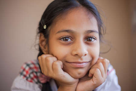 Happy expressions of a cute Indian kid.の写真素材