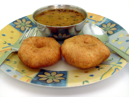A image showing indian south Indian dish named Wada Samber on isolated background with fine clipping...