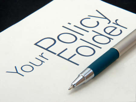 Image showing text policy Folder with pen on isolated white background.の写真素材