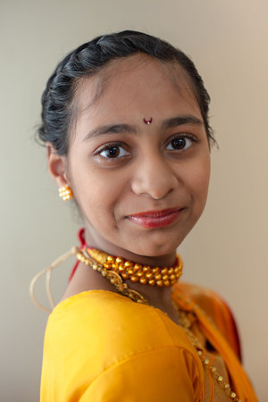 Indian child girl in traditional outfit of state Maharashtra, India