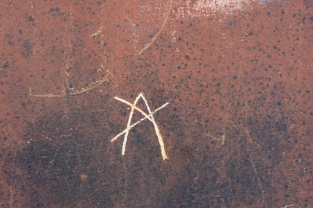 Closeup of rustic and rusted textured metal as an abstract backgroundの写真素材