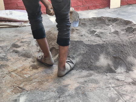 Civil worker mixing sand and concrete. Concrete Slump closeupの写真素材