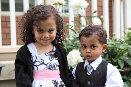 young  multiracial boy and girl portraitの写真素材