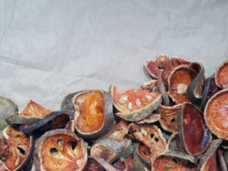 Dried quince fruits on paper background, blur for background , blur for backdropの写真素材
