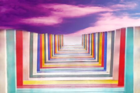 colorful  rainbow wooden bridge by the seaの写真素材