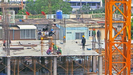 Construction workers are building a building.