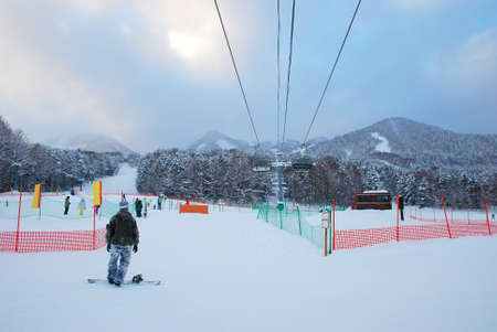 Man  play snow board at Furano snow mountain in  Hokkaido, Japanのeditorial素材