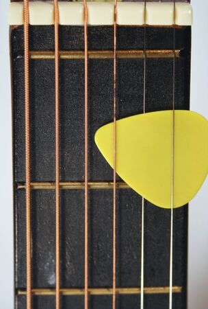 An image of a Acoustic Guitar Neck with Yellow Pickの写真素材