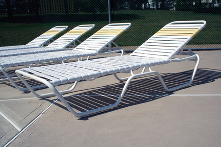 an image of Reclining chairs at the pool