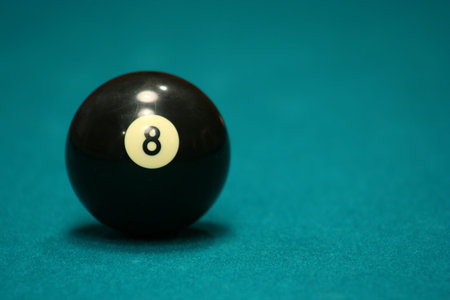 8 ball on green pool table