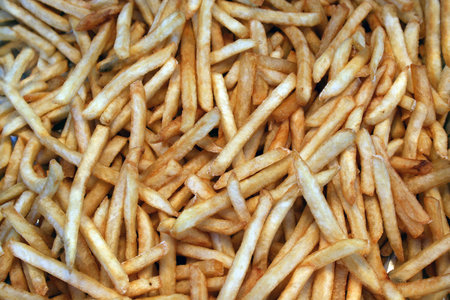 a bunch of french fries ready to eat
