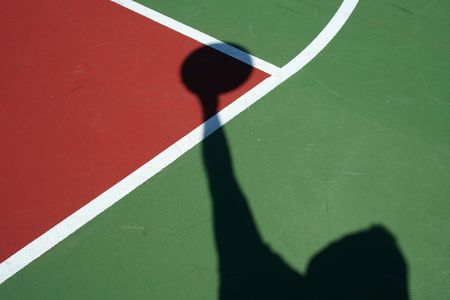 A Shadow Basketball player in the keyの写真素材