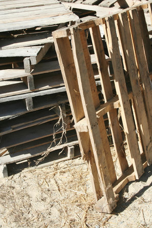 A bunch of Stacked Wooden Pallets