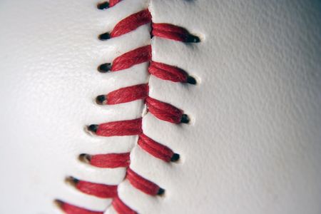 A white Baseball Macro with red stitchingの写真素材