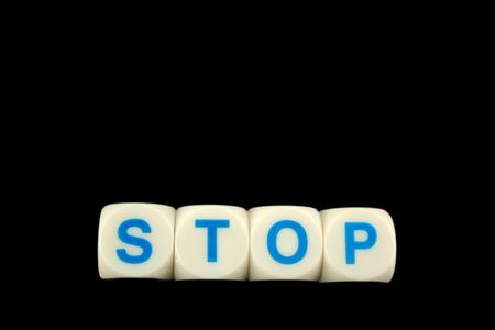 The word stop spelled in blocks isolatedの写真素材
