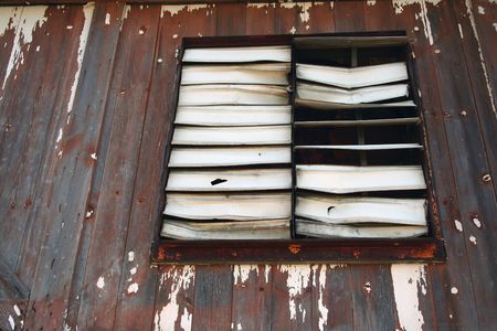 An old Old broken louvered Window の写真素材
