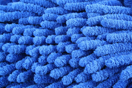 A Blue microfiber duster macro background