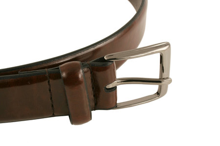 A Isolated brown leather belt with buckle