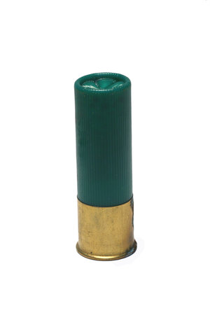 A Isolated 12 gage green shotgun shell