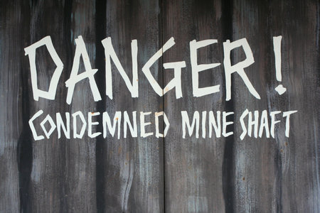 A Danger condemned mine shaft sign