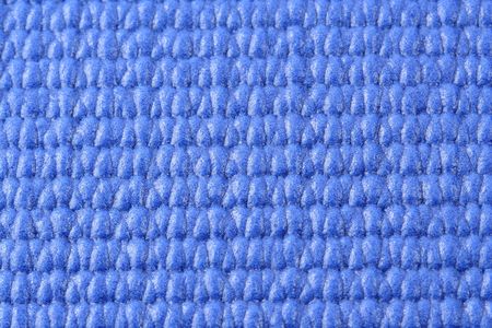 A Macro view of a blue yoga matの写真素材