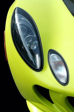 A Yellow sports car headlights