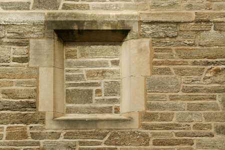 a window filled in with stone