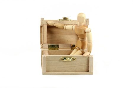 A Wooden manikin in treasure chestの写真素材