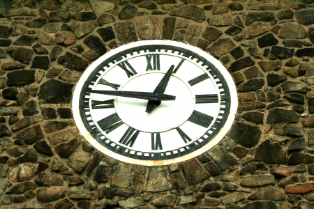 A clock on an old buildingの写真素材