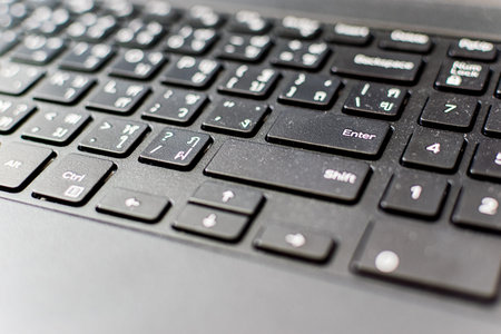 Thailand black keyboard focus on the enter.