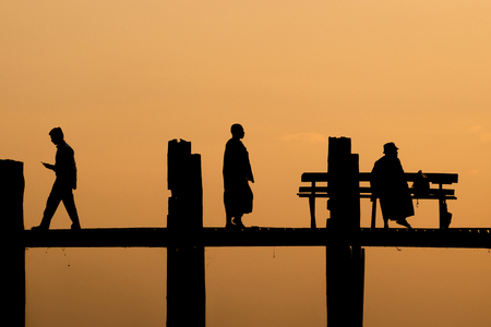 U Bein Bridge during sunset, silhouetteの写真素材