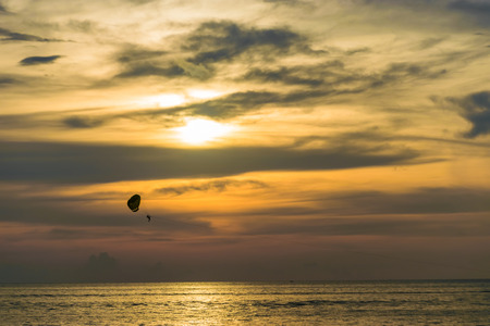 Parasail play during sunsetの写真素材